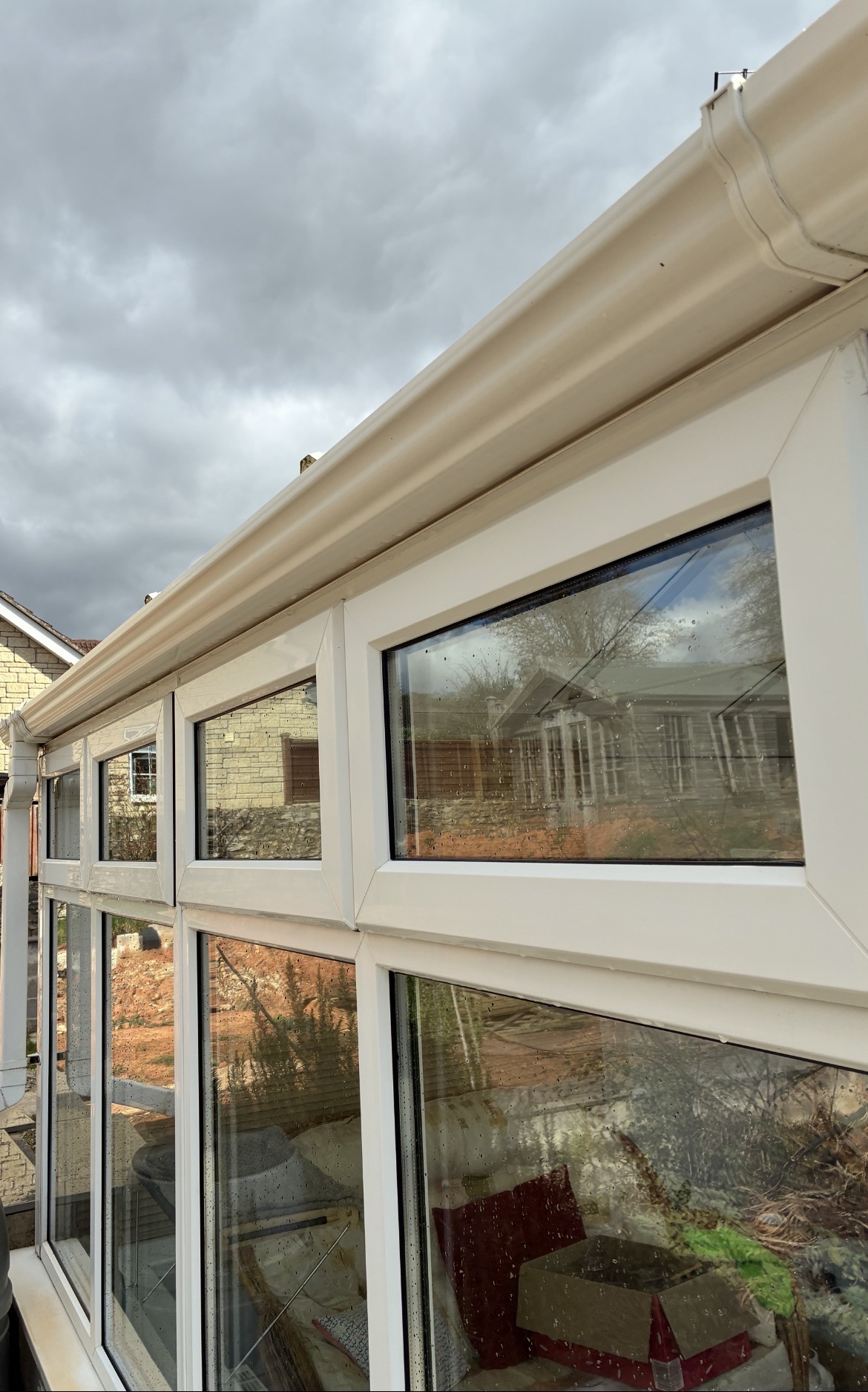 The same gutter and fascia after exterior cleaning